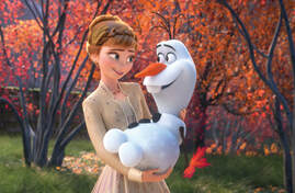 Anna, from Frozen 2, holding Olaf, a magic snowman.